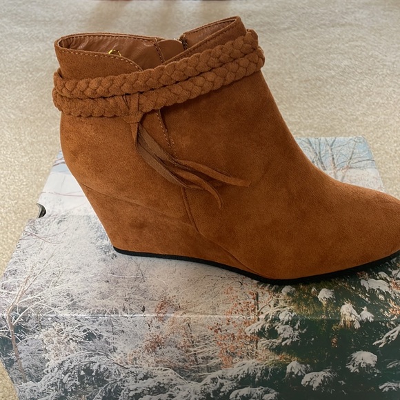 Never worn fawn  wedge bootie with zipper and braid details. - Picture 5 of 8